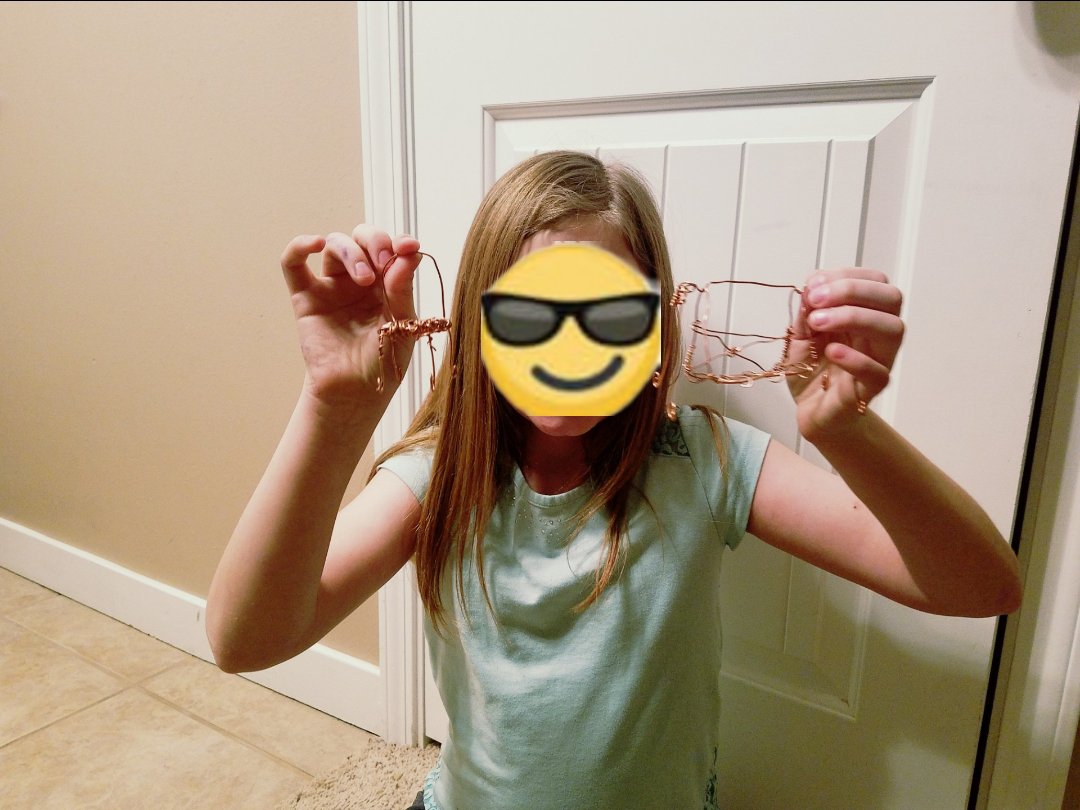 Furniture for doll houses made from copper wire. A doll chair and porch swing. 