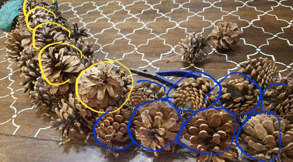 When wired in this pattern pinecones stay in place and the whole garland keeps the desired shape. 