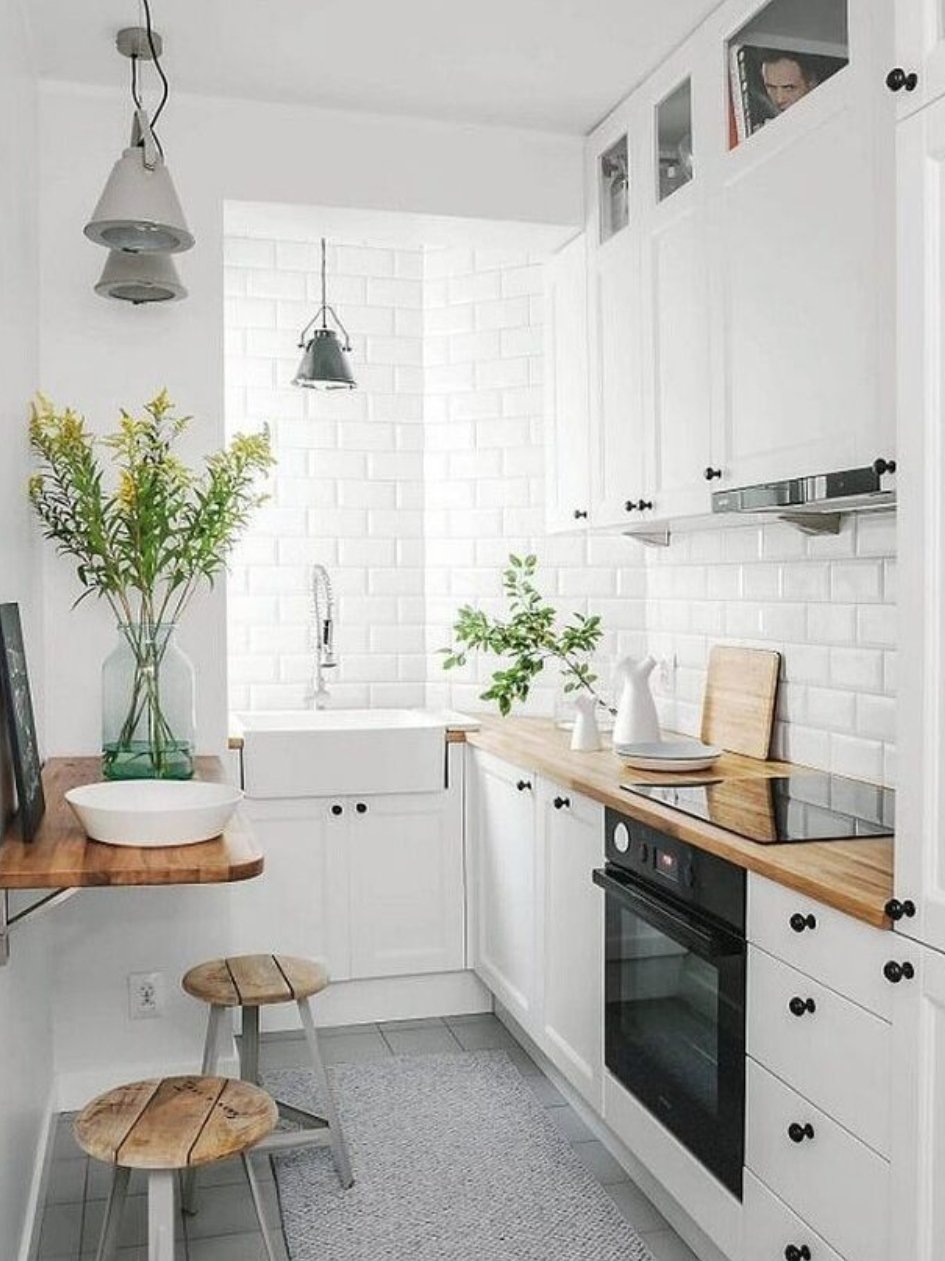 Subway time adds texture and interest to an all white kitchen