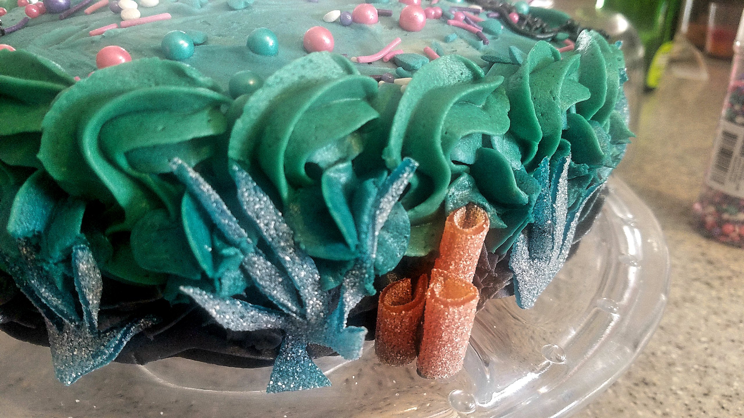 Frosting a mermaid cake