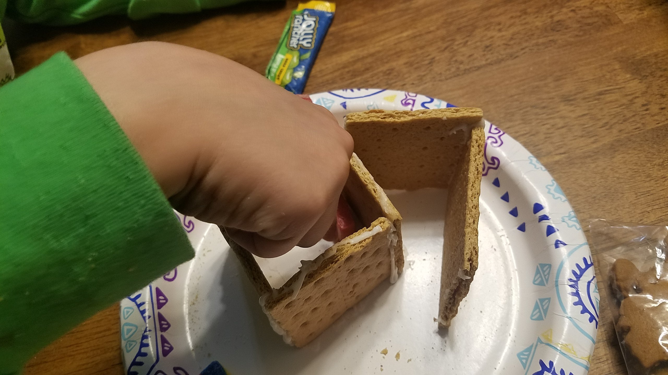 Build the tricky parts of the gingerbread structure first. Let dry and then glue together. 