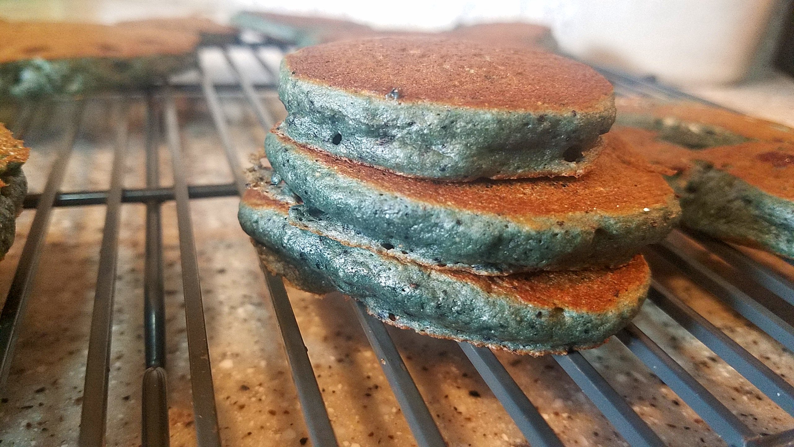 Blended Blueberries and other super food ingredients like chia and flax seeds make these pancakes not only tasty, but healthy too. 
