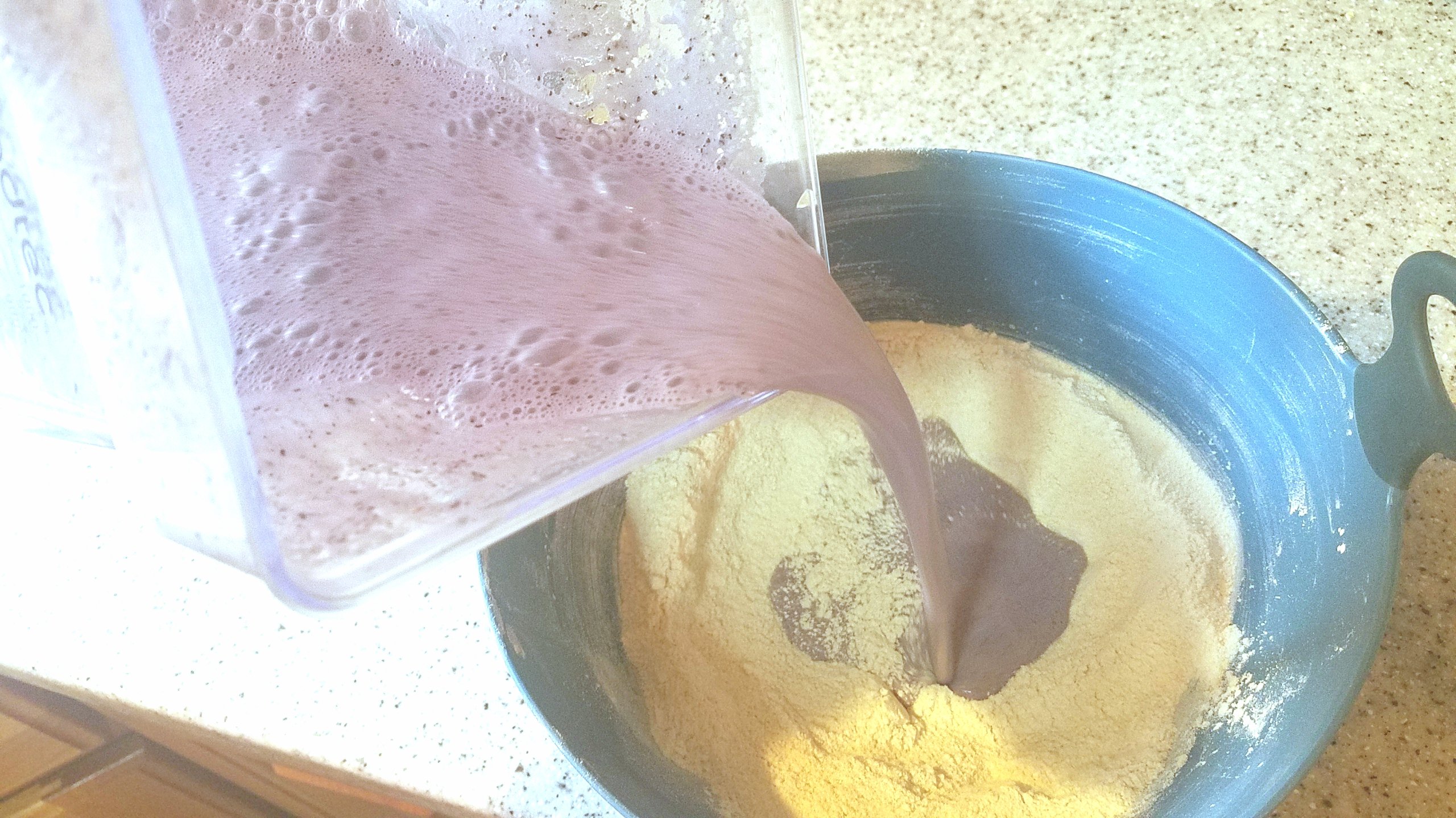 Fold wet ingredients into dry ingredients to create a fluffy Blueberry, blender pancake. 