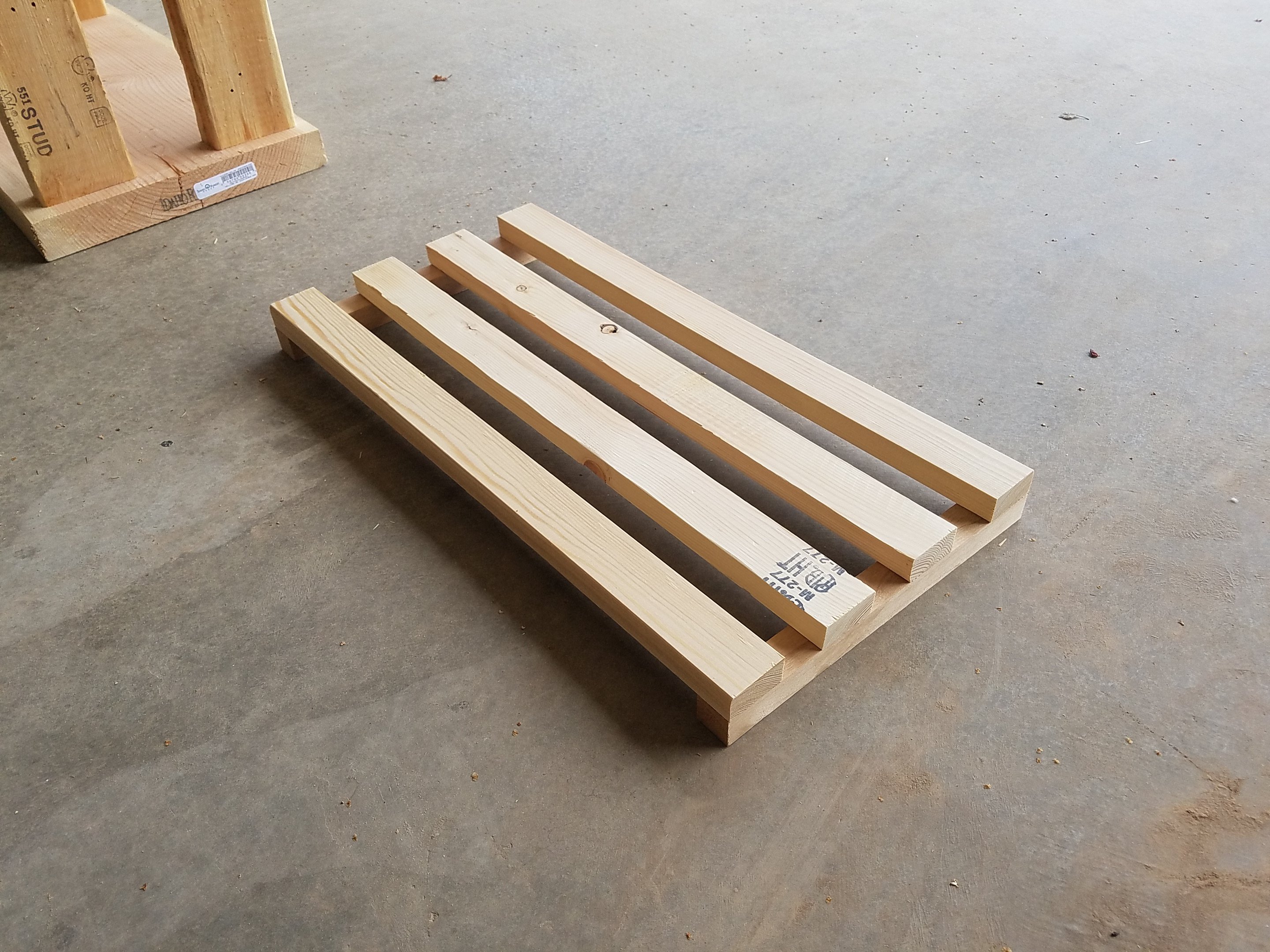 Shoe rack for the bottom of a farmhouse style bench
